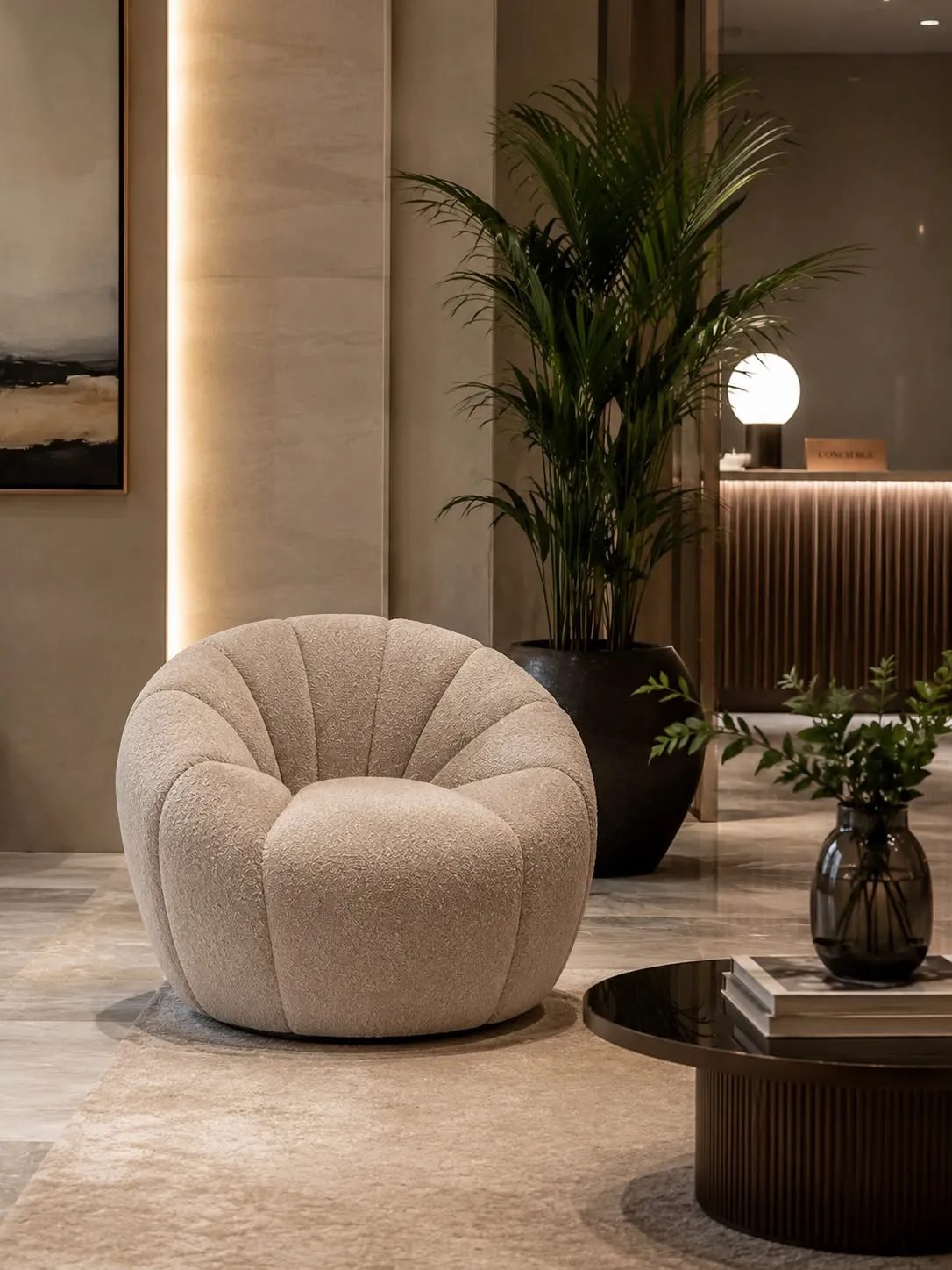 Designfåtölj i bouclé